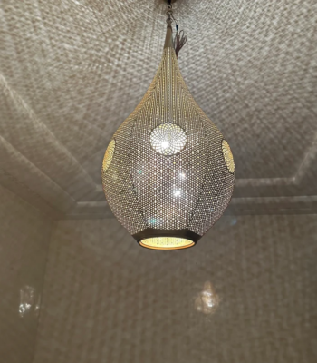 Handcrafted Moroccan teardrop brass pendant light with traditional perforated motifs